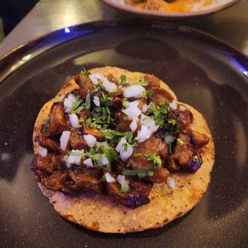 Mothers Restaurant signature dishes Cumin and Cinnamon Braised Pork ShoulderEggplant TostadaFried Tofu